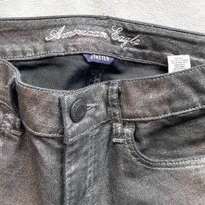 American Eagle. Woman’s size 8 stretch jeggings black/silver metallic